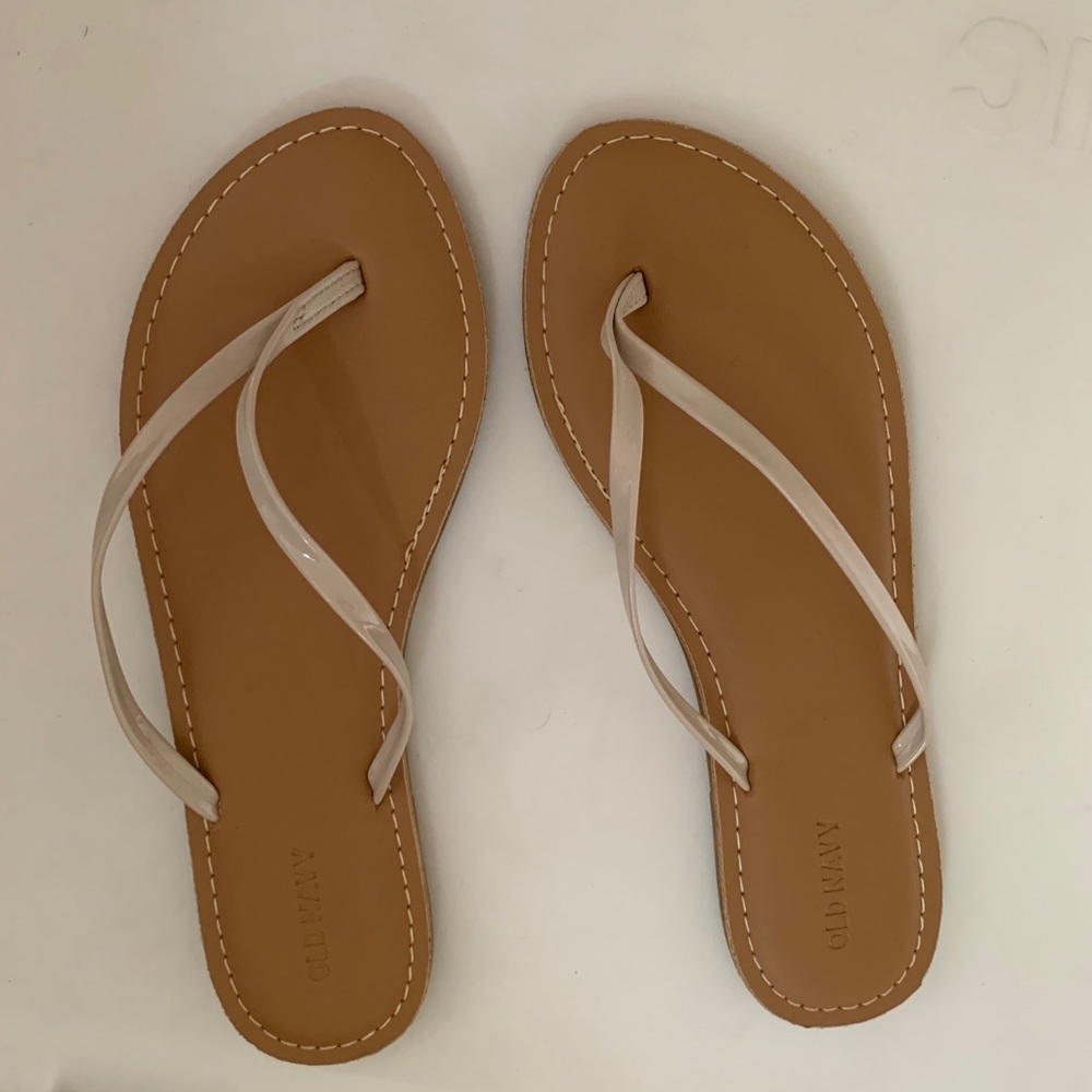 Beige flip flops